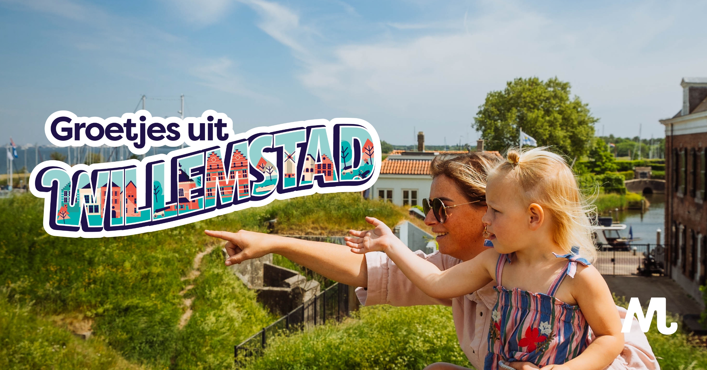 Gezin om de foto in Willemstad